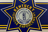 /images/133/1999-07-kentucky-police2.jpg - #00328: logo on Kentucky police car in Lousville … July 1999 -- Louisville, Kentucky