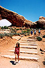 /images/133/2004-07-arches-girl-walking.jpg - #01625: girl walking in Arches National Park … Aneta, Ola and Ewka in background … July 2004 -- Arches Park, Utah