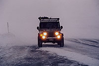 /images/133/2006-02-loveland-jeep3.jpg - 02756: grey Jeep Wrangler in snowstorm at top of Loveland Pass … Feb 2006 -- Loveland Pass, Colorado