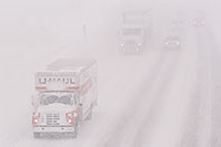 /images/133/2006-03-i70-cars3.jpg - #02806: U-Haul and cars, during blizzard on Highway I-70 west of Golden, heading to Denver … March 2006 -- I-70, Golden, Colorado