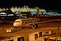 /images/133/2006-10-22-den-frontier01.jpg - #03096: Detroit bound Frontier plane preparing to leave Denver airport … Oct 2006 -- Denver, Colorado