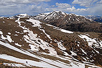 /images/133/2007-06-10-elbert-skier9.jpg - #03905: Skier walking across a snowfield on Mt Elbert … view of Mt Massive at 14,421 ft … June 2007 -- Mt Elbert, Colorado