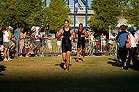 /images/133/2009-09-27-nathan-tri-114007.jpg - #07459: 01:02:19 - Swimmers running towards Transition area at Nathan Triathlon … September 2009 -- Tempe Town Lake, Tempe, Arizona