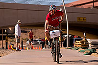 /images/133/2009-11-22-ironman-run-pro-126548.jpg - #07942: 06:08:46 #14 running, 4th place Male - Ironman Arizona 2009 … November 2009 -- Tempe Town Lake, Tempe, Arizona