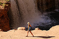 /images/133/2010-06-21-havasu-people-6903.jpg - #08166: Hiker walking by Rock Falls … June 2010 -- Rock Falls, Havasu Falls, Arizona