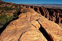 /images/133/2010-09-11-arches-dgarden-32733.jpg - #08632: People heading towards Double O Arch in Devils Garden in Arches National Park … September 2010 -- Devils Garden, Arches Park, Utah