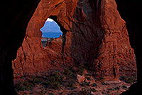 /images/133/2010-09-16-arches-cove-34469.jpg - #08695: View of Double Arch through Cove Arch in Cove of Caves in Arches National Park … September 2010 -- Cove Arch, Arches Park, Utah