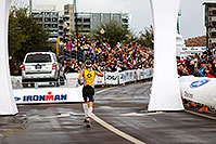 /images/133/2010-11-21-ironman-finish-45875.jpg - #08906: 08:06:27 - #9 Timo Bracht [1st,GER,08:07:16] finishing first - Ironman Arizona 2010 … November 2010 -- Rio Salado Parkway, Tempe, Arizona