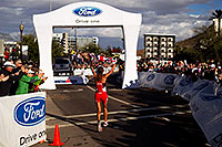 /images/133/2010-11-21-ironman-finish-46010.jpg - #08911: 08:35:18 - #55 Chrissie Wellington [1st,USA,08:36:13] finishing first - Ironman Arizona 2010 … November 2010 -- Rio Salado Parkway, Tempe, Arizona