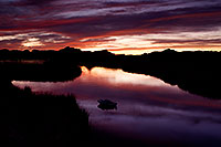 /images/133/2011-04-05-havasu-bill-sunset-65938.jpg - #09127: Boat and evening mountain silhouettes at Lake Havasu … April 2011 -- Lake Havasu, Arizona