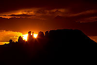 /images/133/2011-07-31-sedona-sunset-89392.jpg - #09390: Sun setting behind rock formations in Sedona … July 2011 -- Sedona, Arizona