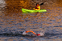 /images/133/2011-09-25-nathan-swim-99289.jpg - #09559: 00:01:56 Leading red cap swimmer starting at Nathan Triathlon 2011 … September 2011 -- Tempe Town Lake, Tempe, Arizona