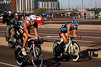 /images/133/2011-11-20-ironman-bike-pros-122343.jpg - #09776: 02:35:27 - #22 Raymond Botelho [USA] (DNF run) and #70 Linsey Corbin [USA] (eventually 2nd in 08:54:33) at start of Lap 2 - Ironman Arizona 2011 … November 2011 -- Rio Salado Parkway, Tempe, Arizona
