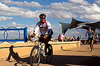/images/133/2011-11-20-ironman-run-pros-123939.jpg - #09804: 07:48:30 - #70 Linsey Corbin [USA] (2nd in 08:54:33) finishing Lap 2 - Ironman Arizona 2011 … November 2011 -- Tempe, Arizona