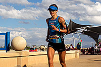 /images/133/2011-11-20-ironman-run-pros-123940.jpg - #09799: 07:48:32 - #70 Linsey Corbin [USA] (2nd in 08:54:33) finishing Lap 2 - Ironman Arizona 2011 … November 2011 -- Tempe, Arizona