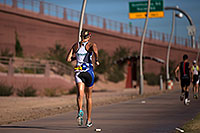 /images/133/2012-11-18-ironman-run-4283.jpg - #10400: 08:01:48 - #70 Leanda Cave [USA, 6th] running at Ironman Arizona 2012 … November 2012 -- Tempe Town Lake, Tempe, Arizona