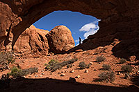/images/133/2013-10-29-windows-north-1dx_1913.jpg - #11181: Hiker in North Window in Arches National Park … December 2013 -- North Window, Arches Park, Utah