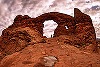 /images/133/2013-10-31-turret-arch-28-1dx_2328.jpg - #11208: Hiker entering through Turret Arch in Arches National Park … October 2013 -- Turret Arch, Arches Park, Utah