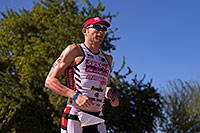 /images/133/2014-11-16-ironman-run-1dx_3885.jpg - #12251: 06:03:17 #42 Patrick Schuster [25th,USA,09:45:46] running at Ironman Arizona 2014 … November 2014 -- Tempe Town Lake, Tempe, Arizona
