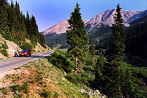 red Jeep Grand Cherokee heading to Aspen from Independence Pass