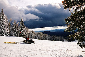 Snowmobiler Ski Patrol at Snowbowl ski area