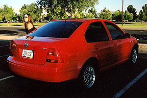 Michelle and her red VW Jetta