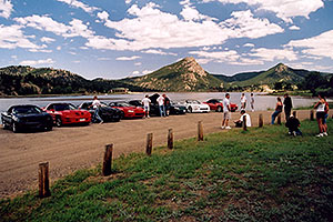 black, red and white Pontiac TransAm cars at Estes Lake