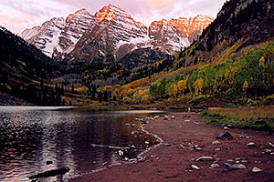 7am sun touches the peaks of Maroon Bells