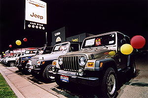 brown, white and blue Jeep Wranglers at Lithia Jeep in Centennial, Colorado