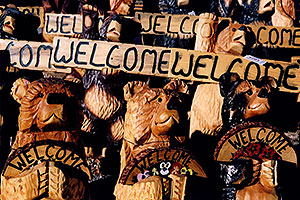 Carved Bear statues with Welcome signs
