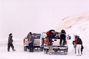 Backcountry Skiers and Snowboarders unloading at top of Loveland Pass