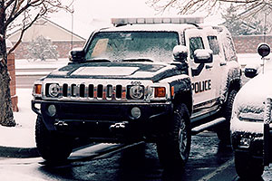 snowy Police Hummers in Lone Tree
