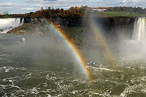 boat within double rainbow heading from Canadian Falls (right) to US Falls (left)