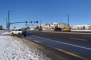 cars at Lincoln and Yosemite Rd in Lone Tree