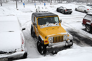 yellow Jeep Wrangler in Englewood