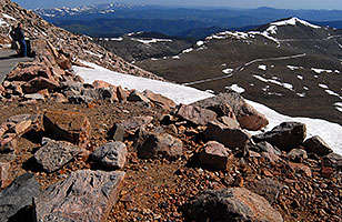 view from 14,133 ft parking lot of Mt Evans  - the snow outlined trail is a road up Mt Evans