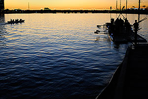 Scullers after sunset at North Bank Boat Ramp at Tempe Town Lake