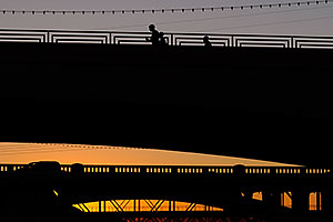 Runners on Mill Road bridge over Tempe Town Lake