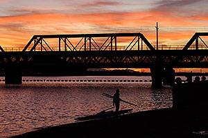 Sculler at sunset on North Bank Boat Beach at Tempe Town Lake