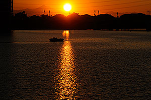 Boat at sunset at Tempe Town Lake