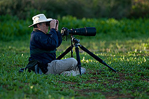 Bird Photography requirements - big lens, low tripod, binoculars, hat, water bottleâ€¦(br)Photographer at Riparian Preserve