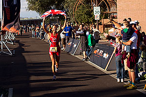 08:35:13 - #55 Chrissie Wellington [1st,USA,08:36:13] finishing first - Ironman Arizona 2010