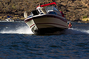 Boat and wakeboarder at Canyon Lake in Superstitions