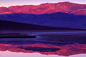 Badwater morning mountain reflection in Death Valley