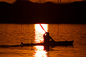 Kayaker at sunset at Tempe Town Lake