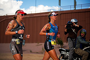06:31:01 - #72 Meredith Kessler [USA] (eventual 4th) and #73 Amanda Stevens [USA] (eventual 5th, 9 minutes later) in Lap 1 - Ironman Arizona 2011