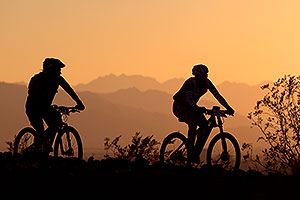 10:08:09 #411 and #241 mountain biking at sunset at 12 Hours of Papago 2012 â€¦