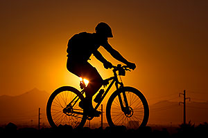 10:21:27 #29 [8th, 19 laps, 12:23:24] mountain biking at sunset at 12 Hours of Papago 2012 â€¦