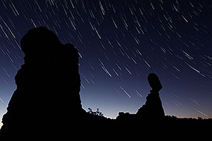 22 minutes of star trails at Balanced Rock in Arches National Park at sunrise
