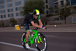 00:56:57 #1 Lionel Sanders [1st,CAN,07:44:29] cycling at Ironman Arizona 2016